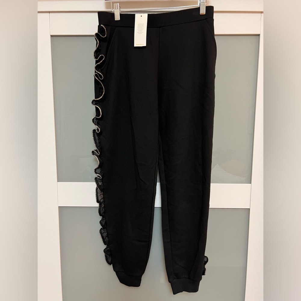 NET Black Jogger Pants with Side Zipper Ruffle by Zayan the Label